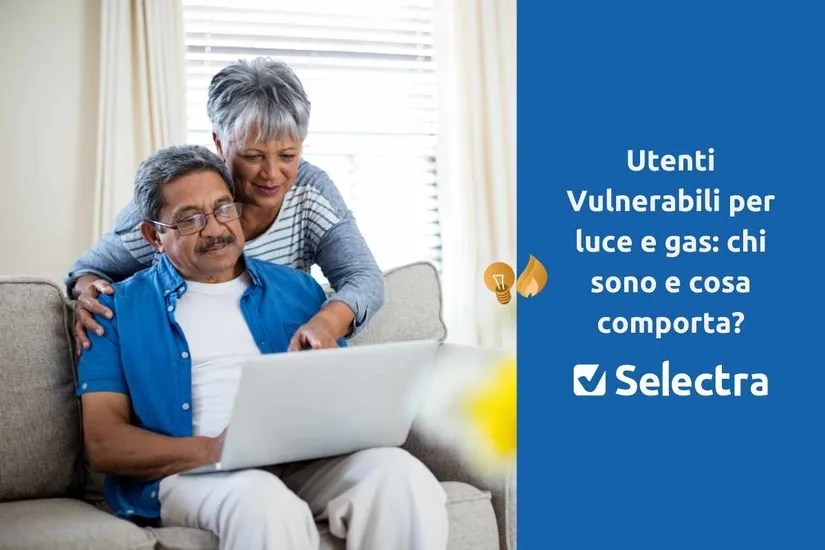 Anziano legge la bolletta con assistente sociale: simbolo delle tutele rafforzate per clienti vulnerabili